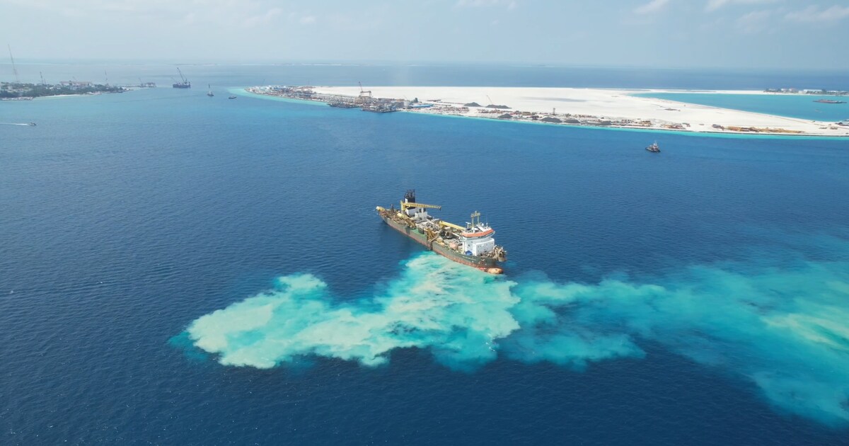 A Dutch company is filling a coral lagoon in the Maldives with sand