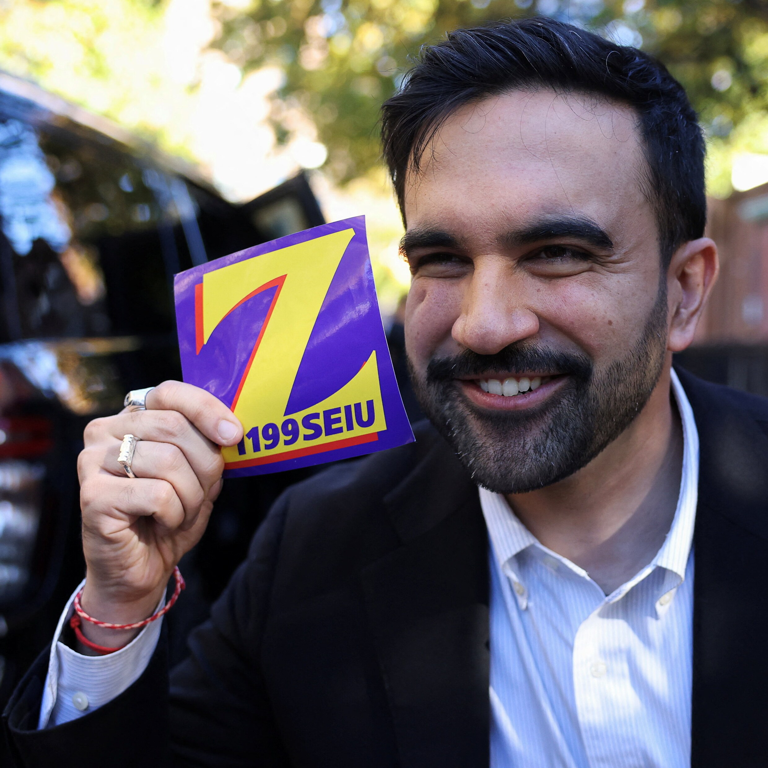 Mamdani op campagne.