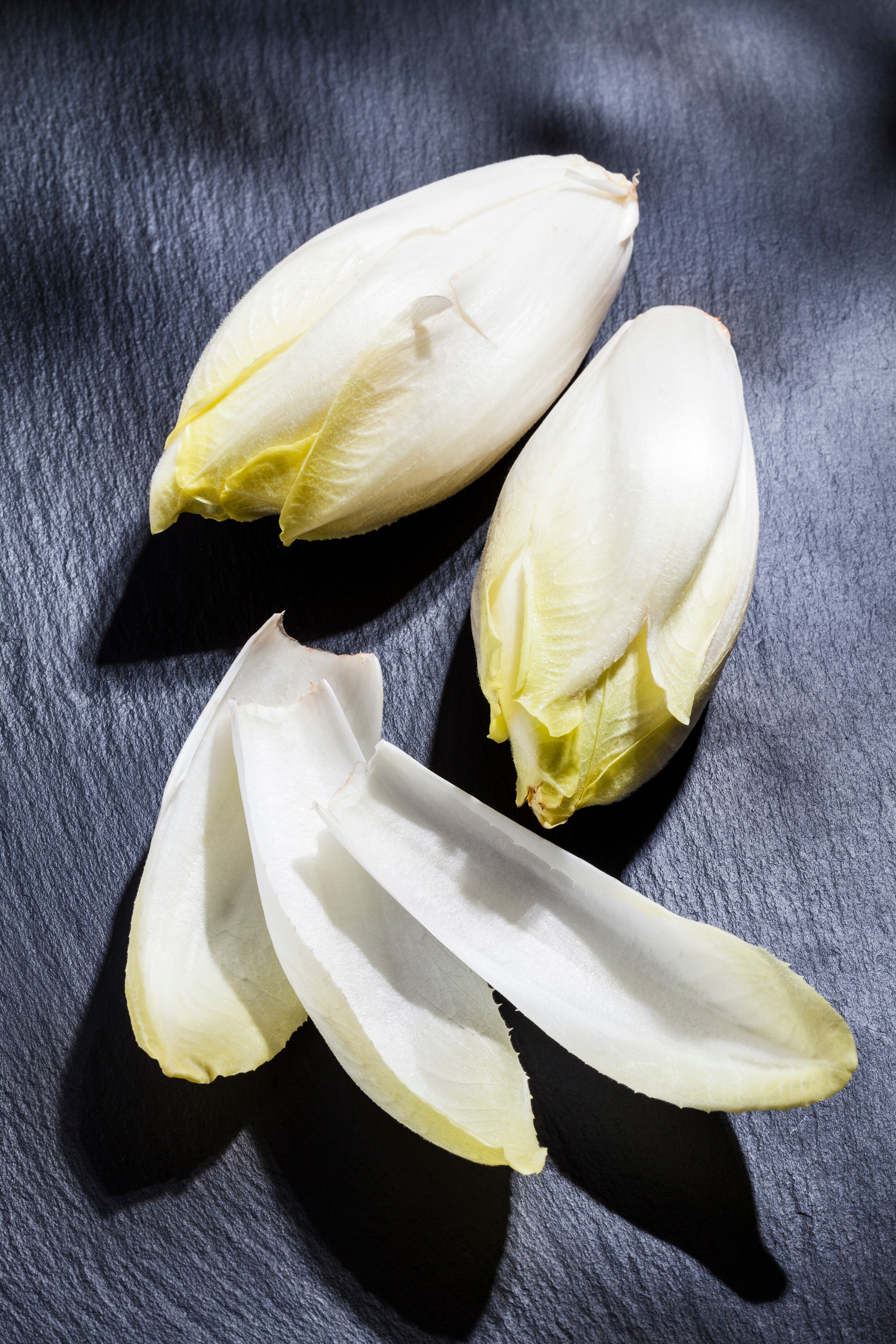 Waarom witlof een echte adventsgroente is: een recept met een diepere laag  | Trouw